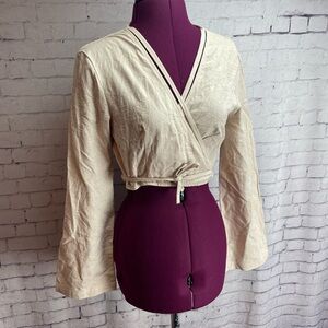 Ghospell size small cram colored wrap top